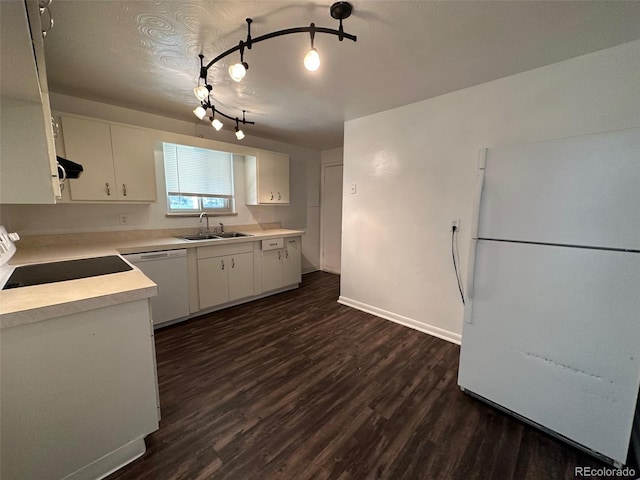 kitchen with dark hardwood / wood-style floors, white cabinetry, and white appliances