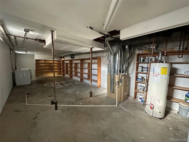 garage featuring heating utilities and water heater