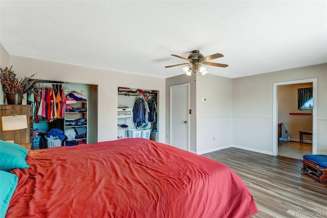 9040 Raleigh St, Westminster, CO 80031 - bedroom with wood finished floors, a baseboard heating unit, and a ceiling fan