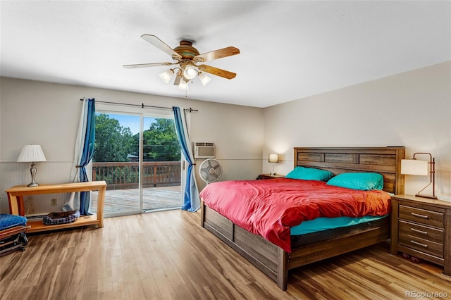 9040 Raleigh St, Westminster, CO 80031 - bedroom featuring access to outside, wood finished floors, an AC wall unit, and ceiling fan