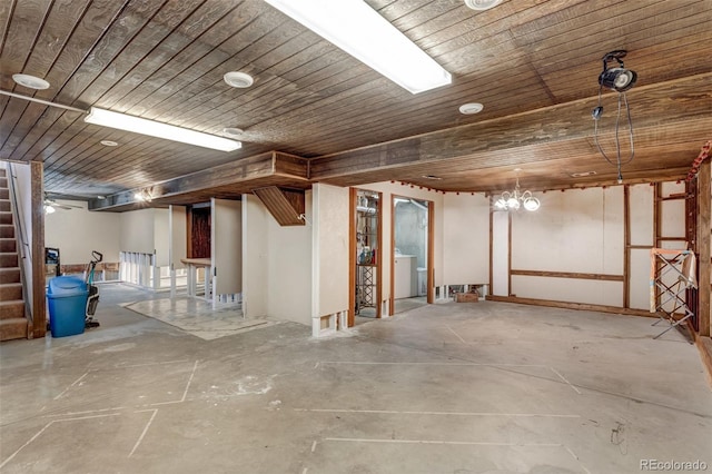 9040 Raleigh St, Westminster, CO 80031 - basement with wood ceiling, washer / dryer, and stairway
