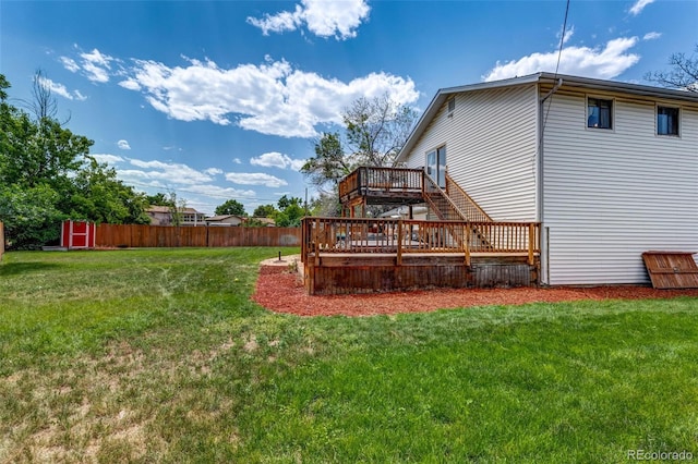 9040 Raleigh St, Westminster, CO 80031 - back of house with a wooden deck and stairs