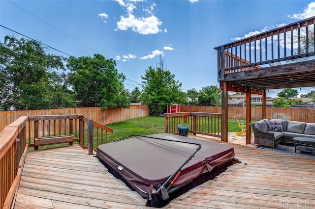 9040 Raleigh St, Westminster, CO 80031 - wooden deck featuring a fenced backyard, a covered hot tub, and an outdoor hangout area