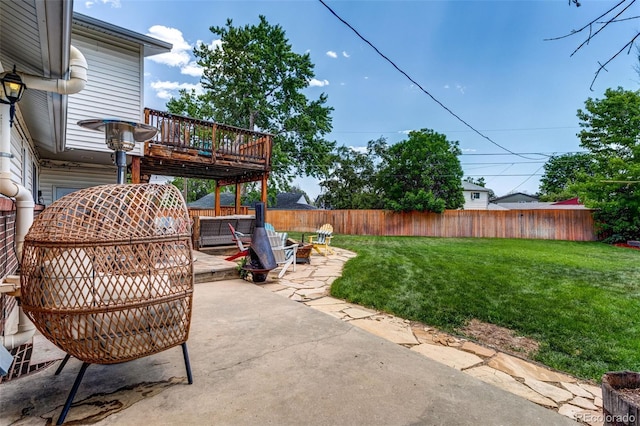 9040 Raleigh St, Westminster, CO 80031 - fenced backyard with a patio, a wooden deck, and grilling area