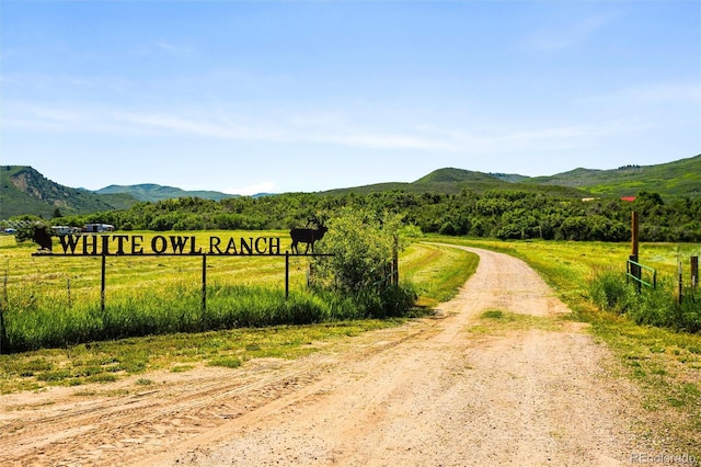 view of street featuring a rural view and a mountain view