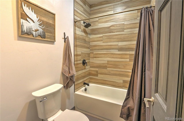 full bath with shower / tub combo and toilet