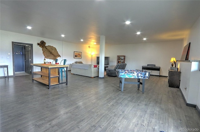 rec room with recessed lighting, wood finished floors, and baseboards