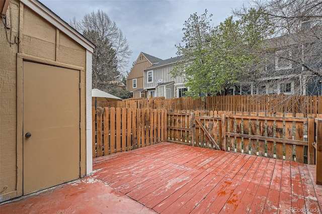 deck with a fenced backyard