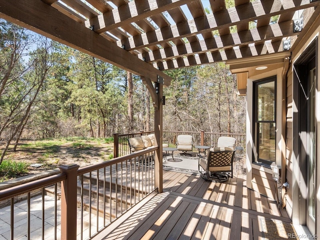 wooden deck with a pergola