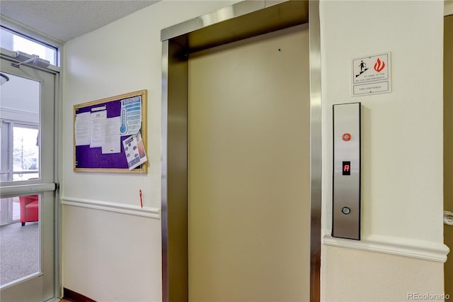 elevator with a textured ceiling