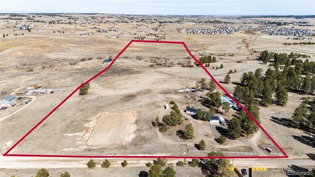 aerial view with a rural view and view of desert