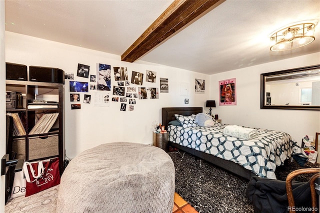 bedroom with beamed ceiling