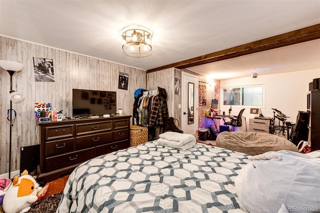 bedroom with beam ceiling