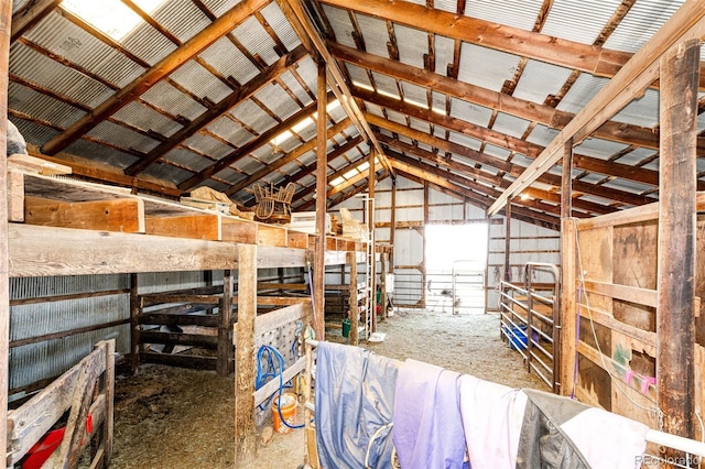 miscellaneous room with lofted ceiling