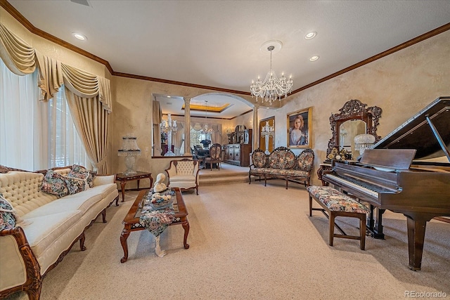 sitting room featuring an inviting chandelier, crown molding, a wealth of natural light, and light carpet