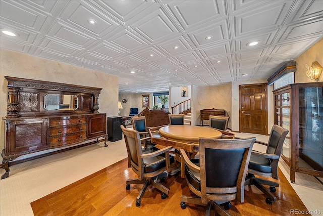 dining space with light hardwood / wood-style flooring