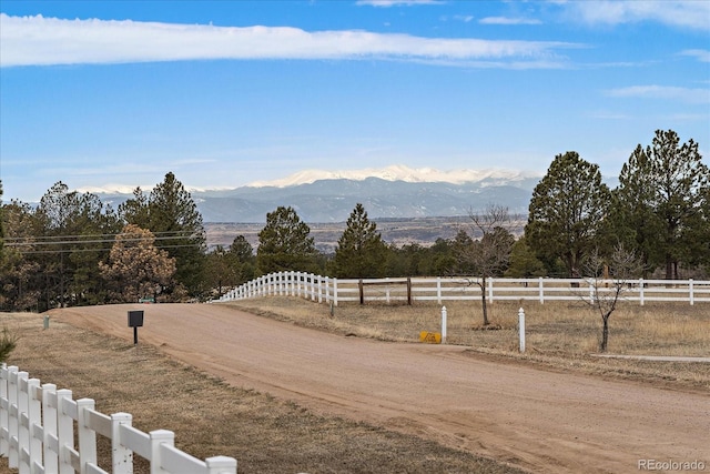 property view of mountains featuring a rural view