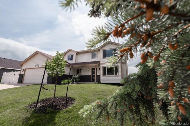1772 Eisenhower, Louisville, CO 80027 - traditional home with an attached garage and driveway