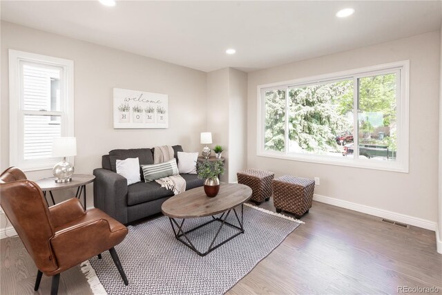 1772 Eisenhower, Louisville, CO 80027 - living room with baseboards, wood finished floors, and recessed lighting
