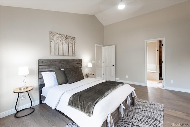 1772 Eisenhower, Louisville, CO 80027 - bedroom with high vaulted ceiling, baseboards, wood finished floors, and ensuite bath