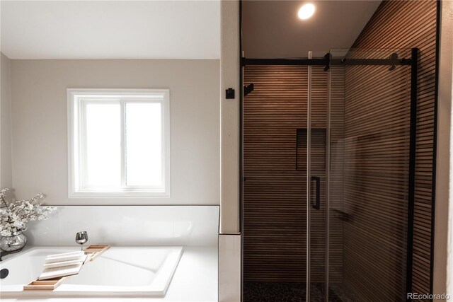 1772 Eisenhower, Louisville, CO 80027 - bathroom featuring a garden tub and a shower stall
