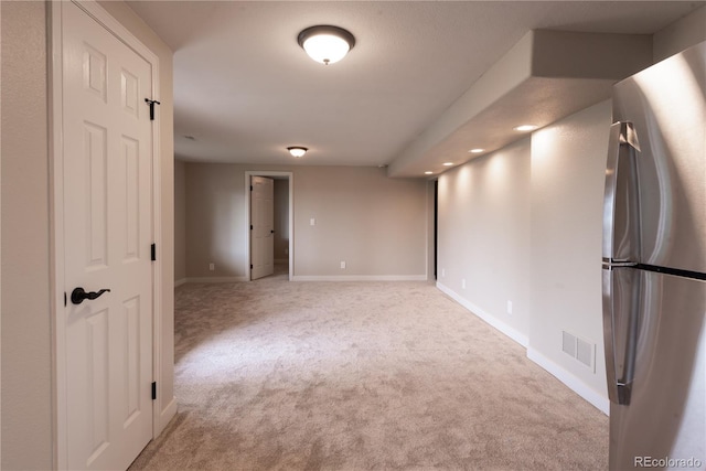 1772 Eisenhower, Louisville, CO 80027 - spare room with light carpet, baseboards, and recessed lighting
