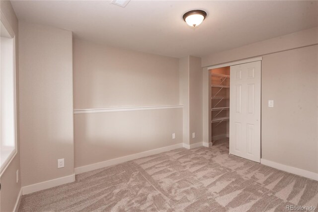 1772 Eisenhower, Louisville, CO 80027 - unfurnished bedroom featuring carpet floors, a closet, and baseboards