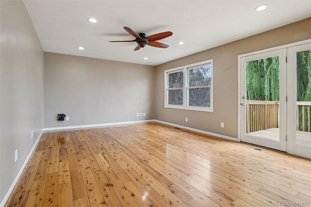 7667 W Brook Dr, Littleton, CO 80128 - unfurnished room featuring ceiling fan, light wood finished floors, and recessed lighting