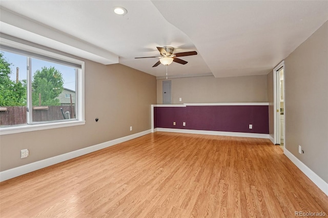 7667 W Brook Dr, Littleton, CO 80128 - unfurnished room with a ceiling fan, light wood finished floors, recessed lighting, and electric panel