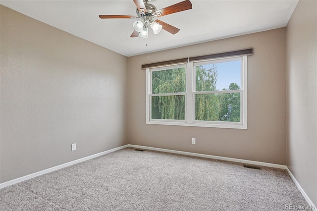 7667 W Brook Dr, Littleton, CO 80128 - carpeted spare room with a ceiling fan and baseboards