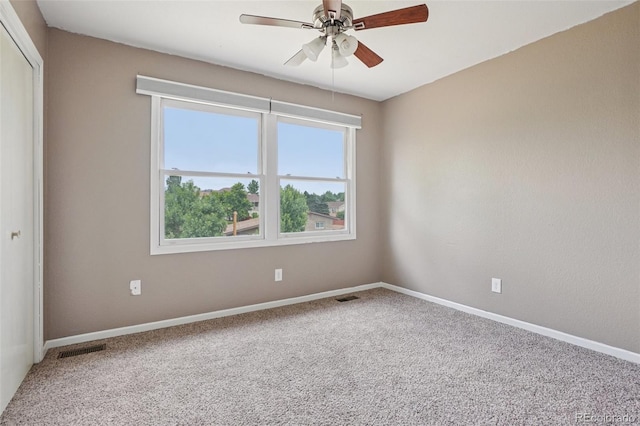 7667 W Brook Dr, Littleton, CO 80128 - carpeted empty room with healthy amount of natural light and a ceiling fan