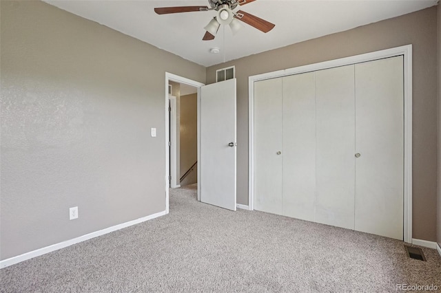 7667 W Brook Dr, Littleton, CO 80128 - unfurnished bedroom with carpet floors, a closet, and a ceiling fan
