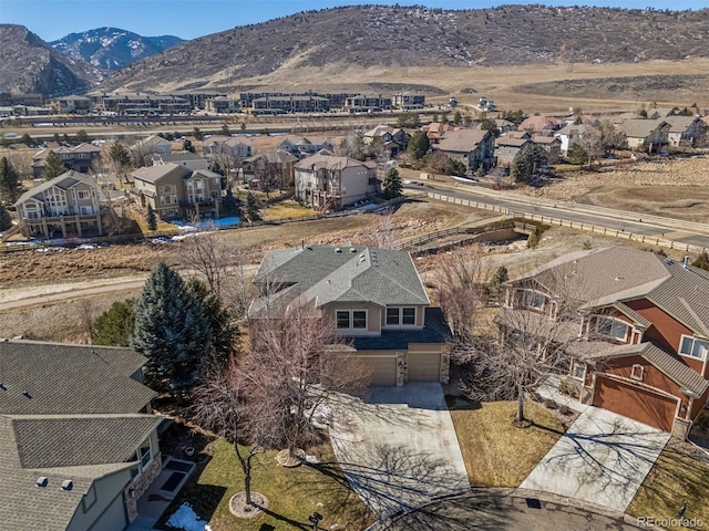 birds eye view of property featuring a residential view and a mountain view