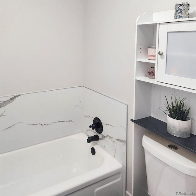 bathroom featuring toilet and shower / bath combination