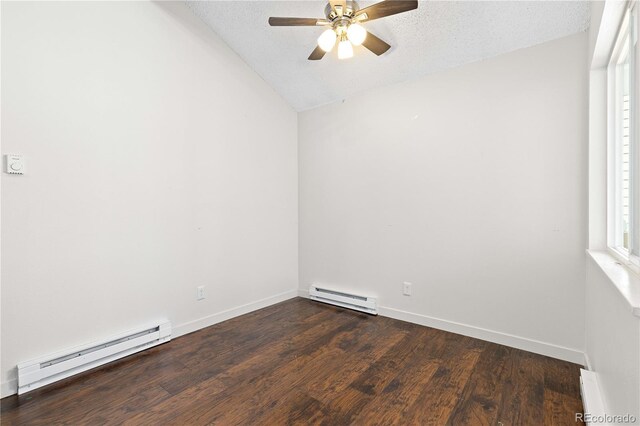 4062 S Atchison Way Unit 302, Aurora, CO 80014 - spare room featuring baseboard heating, a ceiling fan, wood finished floors, lofted ceiling, and baseboards