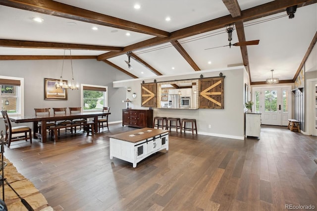 living area featuring plenty of natural light, dark wood-type flooring, baseboards, and recessed lighting
