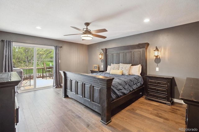 bedroom with access to outside, wood finished floors, recessed lighting, ceiling fan, and baseboards