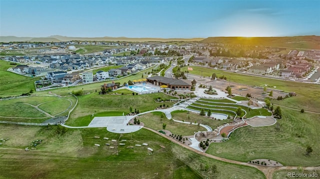 bird's eye view featuring a residential view and a mountain view