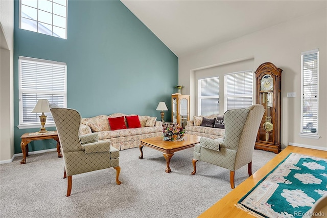 19939 E Belleview Ln, Centennial, CO 80015 - carpeted living room with baseboards and high vaulted ceiling