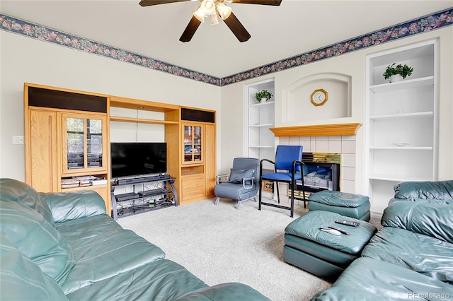 19939 E Belleview Ln, Centennial, CO 80015 - living room featuring ceiling fan, a fireplace, built in features, and carpet