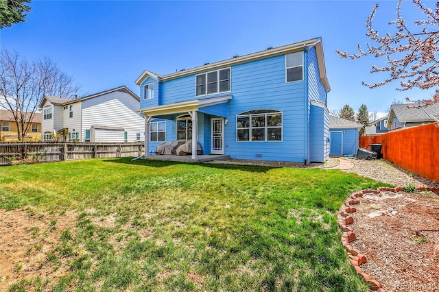19939 E Belleview Ln, Centennial, CO 80015 - rear view of property featuring a fenced backyard and a yard