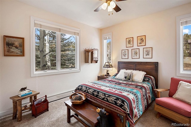 725 Sun Valley Dr, Woodland Park, CO 80863 - bedroom with carpet flooring, baseboards, a baseboard heating unit, and a ceiling fan
