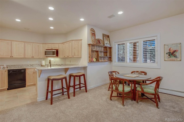 725 Sun Valley Dr, Woodland Park, CO 80863 - dining space featuring recessed lighting, light colored carpet, a baseboard radiator, and baseboards