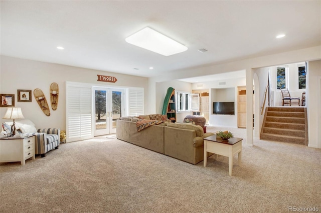 725 Sun Valley Dr, Woodland Park, CO 80863 - living area with carpet, french doors, stairs, and recessed lighting