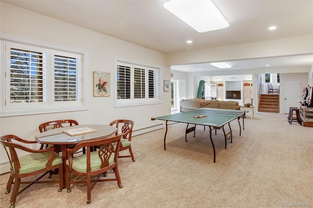 725 Sun Valley Dr, Woodland Park, CO 80863 - rec room featuring baseboard heating, light carpet, recessed lighting, and baseboards