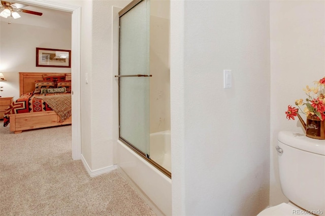 725 Sun Valley Dr, Woodland Park, CO 80863 - ensuite bathroom with toilet, ceiling fan, and enclosed tub / shower combo