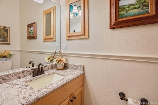 725 Sun Valley Dr, Woodland Park, CO 80863 - half bath featuring vanity and toilet