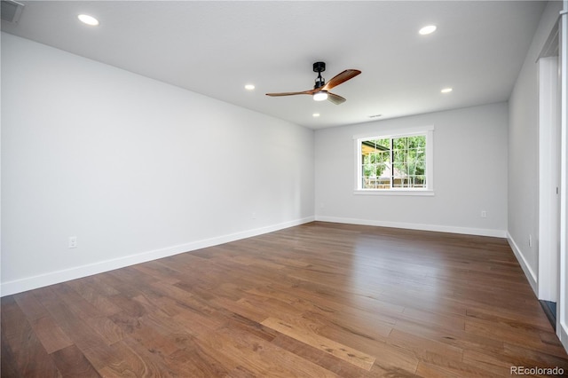 404 S Oneida Way, Denver, CO 80224 - empty room featuring a ceiling fan, dark wood-type flooring, and recessed lighting
