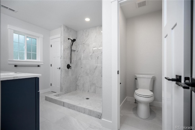 404 S Oneida Way, Denver, CO 80224 - full bath with a marble finish shower, vanity, marble finish floors, and recessed lighting