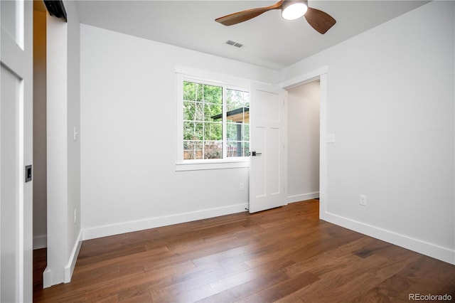 404 S Oneida Way, Denver, CO 80224 - unfurnished bedroom featuring wood finished floors and ceiling fan